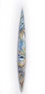 vertical elipse shaped wood object painted with blues and brown colors similar to a stream