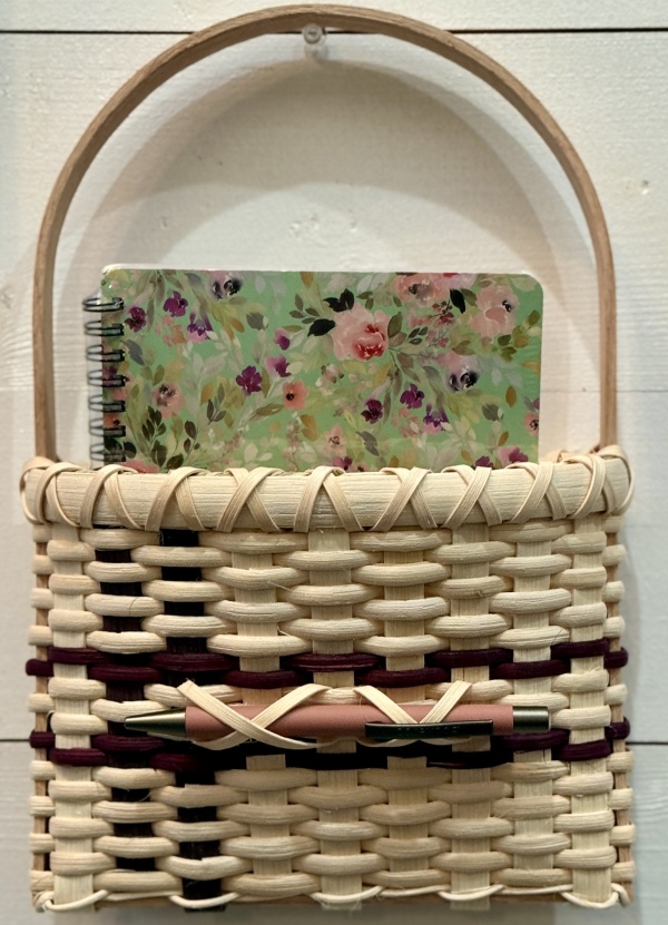 flat-backed woven basket for hanging on the wall