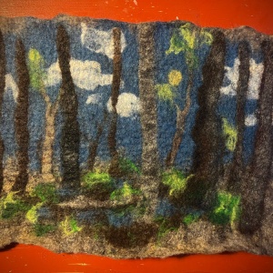 Felted tapestry depicting woodland scene and pond