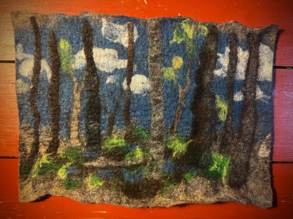 Felted tapestry depicting woodland scene and pond
