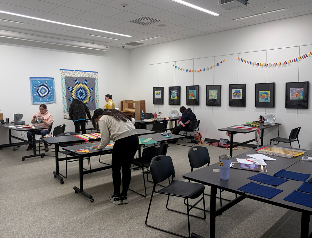 People working on art projects in an education classroom