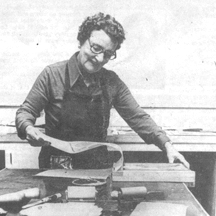 black and white photo of a woman printmaking